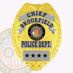 Custom gold metal badge for brookfield police chief with raised eagle design at the top, silver plates with black text naming rank and department, framing the official wisconsin state seal in the center, displaying four black stars on a silver panel at the bottom and equipped with a velcro fastening.