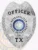 A detailed custom metal badge in silver, prominently displaying the word "OFFICER" at the top. The badge features a star emblem in the center with the text "METROPOLITAN POLICE DEPARTMENT" and "THE STATE OF TEXAS" encircling a blue star. The badge is designed with intricate patterns, including laurel leaves along the edges, and is marked with the number "34" and "TX" at the bottom, showcasing its official status as a personalized police badge.