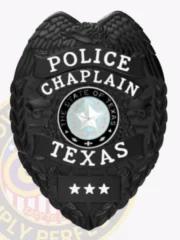 An eye-catching custom metal badge in black color presents a traditional shield design, clearly displaying "POLICE CHAPLAIN" and "TEXAS." The center features the state emblem of Texas and three stars below, equipped with a safety pin attachment for practical use.