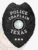 An eye-catching custom metal badge in black color presents a traditional shield design, clearly displaying "POLICE CHAPLAIN" and "TEXAS." The center features the state emblem of Texas and three stars below, equipped with a safety pin attachment for practical use.