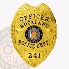 A stunning custom metal badge in all gold, shaped like a shield with detailed engravings. The badge prominently features "officer rockland" at the top and "police dept. " below in elegant lettering. At the center, the state seal of wisconsin is displayed within a circular black backdrop, showcasing intricate designs. The badge also includes the number "241" at the bottom. The bright, reflective surface of this custom metal badge in all gold enhances its authoritative presence, symbolizing pride and professionalism in law enforcement.