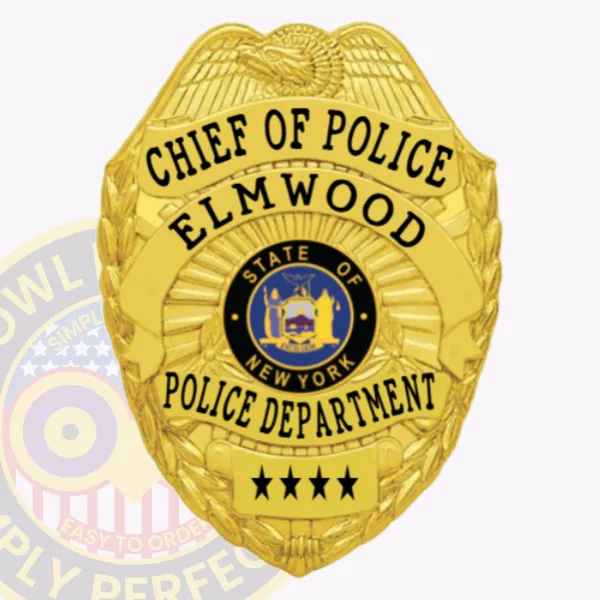 A custom metal badge in a radiant gold color, prominently displaying the title "CHIEF OF POLICE" at the top and "ELMWOOD" below. The badge features the state emblem of New York within a circular design, along with "POLICE DEPARTMENT" at the bottom. It includes a safety pin attachment for secure wear on uniforms.