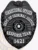 A custom metal badge in a sleek black color, shaped like a shield, representing a Correctional Officer from the Department of Criminal Justice in Texas. The badge prominently features "CORRECTIONAL OFFICER" at the top, followed by "DEPT. OF CRIMINAL JUSTICE" in bold white letters. In the center, it showcases the state seal of Texas, surrounded by decorative elements. The badge reads "RESPONSE TEAM" and the number "1421" at the bottom, and includes a safety pin attachment on the back for secure wear by correctional personnel, emphasizing its practical design and authority.