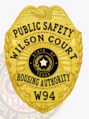 Highlighted is a custom metal badge in gold, displaying "HOUSING AUTHORITY W94" alongside the State of Texas emblem. The badge features a sturdy safety pin attachment, making it an ideal choice for security personnel who require reliable identification.