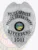 Silver metal badge for Riverbend Police Officer with an eagle emblem at the top, clear black text including "POLICE DEPARTMENT RIVERBEND" and "POLICE OFFICER," centered Ohio state seal, numbered "1011," and attached by a safety pin.