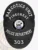 Custom black oval metal badge for Pinecrest police the narcotics unit with safety pin attachment, featuring a textured black background with radiating lines, white text reading "NARCOTICS UNIT" at the top, "PINECREST" above the State of Maine seal, "POLICE DEPARTMENT" below, and badge number "303" at the bottom.