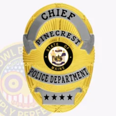 Pinecrest police department gold oval metal badge for chief, decorated with a radiant gold base and silver banners with black text for "chief," "pinecrest," and "police department," featuring a four-star silver plate at the bottom and the maine state seal prominently displayed.