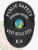 This elegant custom metal badge in black color with a safety pin attachment displays the words "PUBLIC SAFETY," "EMERGENCY RESPONSE," and "WEST HILLS CITY." The badge features a striking design with a central emblem representing the California state seal, reflecting commitment to service.