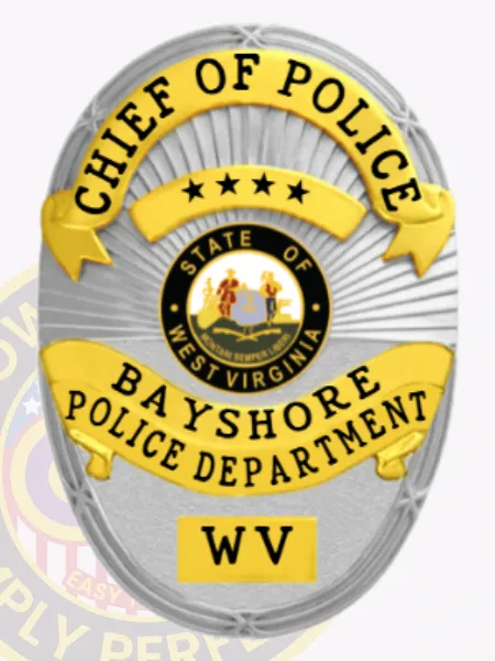 This custom metal badge in silver features a classic oval shape with elegant gold accents. The title "CHIEF OF POLICE" is prominently displayed at the top in bold black letters. Below, the badge showcases the emblem of the Bayshore Police Department at the center, encircled by "STATE OF WEST VIRGINIA." The bottom section reads "BAYSHORE POLICE DEPARTMENT" and "WV," ensuring clear visibility. A safety pin attachment allows for secure wearing.
