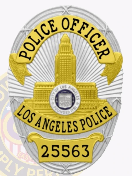 Oval-shaped custom metal badge for LAPD, displaying a detailed gold city hall emblem on a silver background with sunburst pattern, with yellow banners above and below stating POLICE OFFICER and LOS ANGELES POLICE, plus a gold-yellow plate showing the badge number 25563, equipped with safety pin for easy attachment.