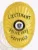 Custom gold oval metal badge for Westfield police the lieutenant with safety pin attachment, featuring a bright gold laurel wreath border and sunburst background, black text on gold banners reading "LIEUTENANT," "POLICE DEPT.," and "WESTFIELD," surrounding the Commonwealth of Massachusetts seal in the center.