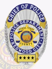 This elegant custom metal badge in silver showcases stunning gold and blue reverse enamel panels, displaying "CHIEF OF POLICE" at the top. The central design features a gold star with the California state seal, framed by "POLICE DEPARTMENT," "SIERRA VERDE," and "REDWOOD CITY." Four stars add to the badge's authoritative presence at the bottom, and it includes a safety pin attachment for easy wear.