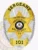 This image depicts a custom flex badge finished in bright silver with elegant gold accents and equipped with a safety pin attachment. The badge features the title "SERGEANT" at the top, with "PINE RIDGE COUNTY PINEVILLE HEIGHTS POLICE DEPT. CO" elegantly wrapping around a central police emblem. The number "101" is clearly visible at the bottom, providing a personalized touch.
