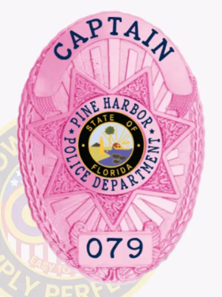 This stylish custom metal badge in BCAM pink highlights a detailed star pattern. It features "CAPTAIN" prominently at the top, with the central emblem displaying "PINE HARBOR POLICE DEPARTMENT" and the state seal of Florida, along with the number "079," all fastened securely with velcro for practical use.