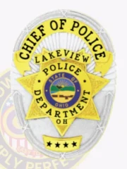 Elegant silver custom metal badge with gold panels, prominently featuring "CHIEF OF POLICE" at the top in bold black letters. The badge includes "LAKEVIEW POLICE DEPARTMENT," the state name, and a central emblem, along with decorative stars at the bottom, all attached securely with a reliable safety pin for practicality.