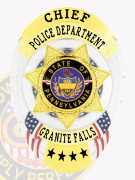 A custom metal badge in silver with gold panels and a safety pin attachment, prominently displaying "CHIEF" at the top. Below, "POLICE DEPARTMENT" is elegantly inscribed, with a star design featuring the state seal of Pennsylvania at its center. The badge's shiny silver finish is complemented by vibrant gold accents, creating an authoritative and distinguished appearance.