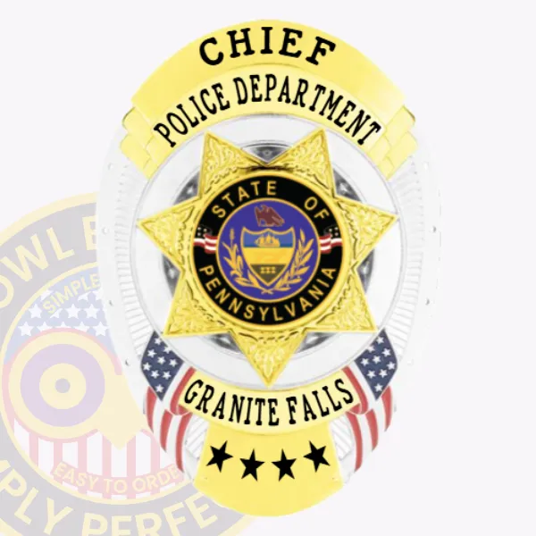 An eye-catching custom metal badge in silver with gold panels and a safety pin attachment, showcasing "GRANITE FALLS" boldly across the middle. The star emblem at the center features the state seal of Pennsylvania, framed by decorative elements that enhance its visual appeal, including colorful ribbons.
