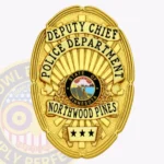 Vintage Oval Shield Badge with Floral Center, Sunburst Background, 4 Text Panels, Ribbed Edge view 1