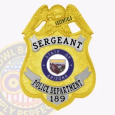 Custom police badge for greenfield sergeant with a prominent gold eagle at the top, gold shield body with silver panels displaying rank and department text, including "sergeant" and "police department 189," plus the arizona state seal in blue, fastened with a safety pin.