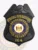 Brookhaven Police Special Operations custom black shield badge featuring an embossed black eagle at the top, yellow text bands with "SPECIAL OPERATIONS" and "BROOKHAVEN POLICE DEPARTMENT," the Delaware state seal in the center, and "164" displayed at the bottom, attached with safety pin.