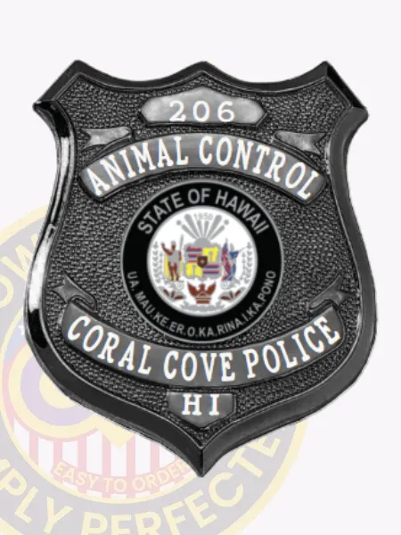 Custom black shield metal badge for Coral Cove police the animal control with safety pin attachment, showing a glossy black shield with white lettering for "ANIMAL CONTROL," "CORAL COVE POLICE HI," the State of Hawaii seal in full color at the center, and badge number "206" on a top gray panel.