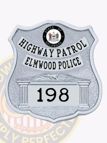 Custom silver shield metal badge for Elmwood police the police chief with safety pin attachment, displaying a reflective silver shield badge with dotted texture, bold black text reading "HIGHWAY PATROL" and "ELMWOOD POLICE," a round Delaware state seal near the top, and badge number "198" on a silver banner at the base.