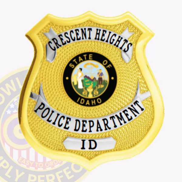 Official custom gold shield metal badge for Crescent Heights Police with polished silver panels displaying black text, colorful Idaho state seal at the center, textured gold surface, and safety pin attachment for secure wear.