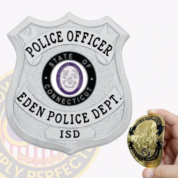 Custom silver shield flex badge for Eden police the police officer with velcro attachment, featuring a textured silver shield with black text reading "POLICE OFFICER," "EDEN POLICE DEPT.," and "ISD," with the State of Connecticut seal centered.