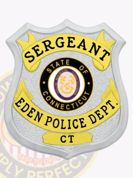 Detailed custom silver shield metal badge with gold panels for Eden police the sergeant with safety pin attachment, featuring a bright silver shield with curved gold text panels reading "SERGEANT" and "EDEN POLICE DEPT.," the Connecticut state seal in purple and white in the center, and a gold banner with "CT" below.