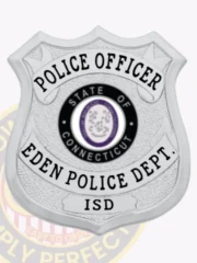 Custom silver shield metal badge for Eden police the police officer with safety pin attachment, displaying a smooth silver shield with bold black text panels stating "POLICE OFFICER," "EDEN POLICE DEPT.," and "ISD," alongside the circular Connecticut state emblem at the center.