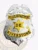 Police Department badge for Riverstone in silver metal featuring a prominent silver eagle at the top, gold banners with black text for "POLICE DEPARTMENT" and "RIVERSTONE," a central gold six-point star marked with "DE," secured with safety pin.