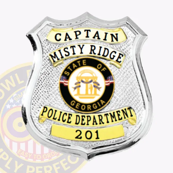 Shiny custom silver shield metal badge with gold panels for Misty Ridge police the captain with safety pin attachment, displaying a hammered silver shield with bright gold panels featuring black lettering for "CAPTAIN," "MISTY RIDGE," "POLICE DEPARTMENT," and "201," and the State of Georgia seal prominently centered.