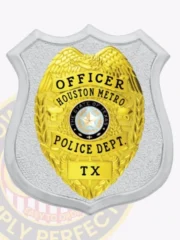 Custom silver shield metal badge with an inner eagle top shield for Houston Metro police the officer with safety pin attachment, displaying a smooth silver shield with textured background and a gold eagle-shaped inner badge, black text reading "OFFICER," "HOUSTON METRO," "POLICE DEPT.," and "TX," encircling the official Texas seal.