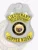 Silver metal badge shaped like a shield for Copper Ridge police lieutenant, crowned by a silver eagle figure, gold curved panels with black text for rank and department, including "LIEUTENANT," "POLICE DEPARTMENT," and "COPPER RIDGE," highlighted by a central black and gold Arizona emblem, fastened by safety pin.