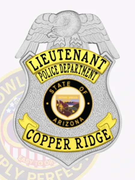 Silver metal badge shaped like a shield for Copper Ridge police lieutenant, crowned by a silver eagle figure, gold curved panels with black text for rank and department, including "LIEUTENANT," "POLICE DEPARTMENT," and "COPPER RIDGE," highlighted by a central black and gold Arizona emblem, fastened by safety pin.