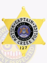 This image features a custom 6 point star flex badge for Willow Creek police, representing the Captain rank. The badge boasts a shiny gold finish complemented by silver panels, with a central design that states "WILLOW CREEK POLICE" and "STATE OF MICHIGAN," secured by a practical velcro attachment.