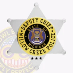 Displayed here is a custom 6 point star flex badge for willow creek police, specifically for the rank of deputy chief. The badge features a silver body accented by gold panels, with a central circle stating "state of michigan" surrounded by "willow creek police," and includes a convenient velcro attachment for easy fastening.