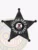 Black five-point star metal badge for Pine Bluff Police Department, showing bold white lettering around the star reading “POLICE DEPT. PINE BLUFF” with the official Illinois state emblem centered, attached by a safety pin.