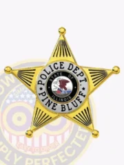Pine Bluff Police custom metal badge shaped as a gold 5 point star with silver panels, featuring black lettering “POLICE DEPT. PINE BLUFF” encircling the blue and red Illinois state seal, finished with a safety pin.