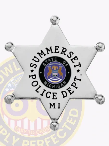 This custom 6 pointed star metal badge for Summerset Police gleams in silver, with "SUMMERSET POLICE DEPT." beautifully arranged around the central Michigan state seal. The safety pin attachment provides a secure fit, making it perfect for use by law enforcement personnel.