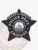 Five-point black metal star badge for Chicago Police Traffic Safety, displaying white text “TRAFFIC SAFETY POLICE DEPT. CHICAGO” around the City of Chicago seal in the middle, equipped with a safety pin fastener.