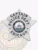 Silver metal 5 point star badge for Chicago Police Captain, including black lettering encircling the City of Chicago seal stating “CAPTAIN POLICE DEPT. CHICAGO,” equipped with a safety pin for secure attachment.