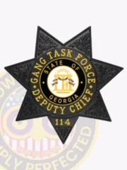 Sleek black custom metal badge prominently displaying "GANG TASK FORCE" at the top in bold yellow letters. The star-shaped badge features a central circular emblem with "DEPUTY CHIEF" and "STATE OF GEORGIA" surrounding it, along with the number "114" at the bottom. It includes a safety pin attachment for secure and convenient wear.