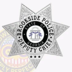Distinctive silver custom metal badge displaying "brookside police" at the top in bold lettering. The intricate star layout includes a central emblem with "deputy chief" and "state of georgia," all secured by a functional safety pin attachment for easy fastening.
