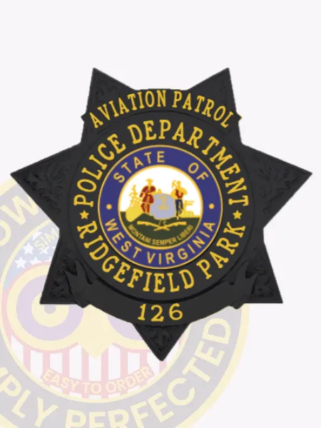 This custom 7-point star metal badge for Ridgefield Park police stands out in a polished black finish. "AVIATION PATROL" is prominently displayed at the top, while the circular emblem features West Virginia’s state seal in the center. The badge reads "POLICE DEPARTMENT" and "RIDGEFIELD PARK," along with the number "126." Equipped with a velcro attachment, it offers practicality for law enforcement professionals.