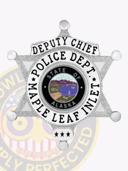 Silver six-pointed star metal badge for Deputy Chief of Maple Leaf Inlet Police Department, featuring clear black lettering on white panels around a detailed State of Alaska circle, with three stars below and a safety pin attachment for fastening.