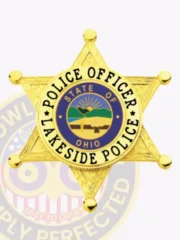Custom gold 6 point star badge for Lakeside Police Officer, highlighted by intricate gold engraving and black lettering around the central blue and green State of Ohio seal, attached via safety pin.