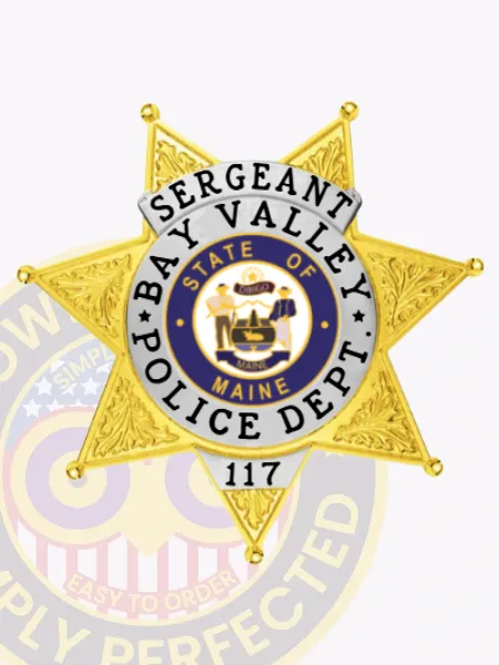 Polished gold custom metal badge featuring silver panels, prominently displaying the title "SERGEANT" at the top in bold black letters. The star-shaped badge includes "BAY VALLEY POLICE DEPT." and "STATE OF MAINE" surrounding a central emblem, along with the number "117" at the bottom. It comes with a safety pin attachment for secure and convenient wear.