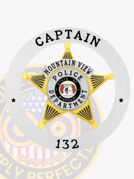 This sleek badge showcases a vibrant 5-point gold star framed by a shiny silver circle banner. The designation "CAPTAIN" arcs gracefully at the top, with "MOUNTAIN VIEW POLICE DEPARTMENT" inscribed around the star. The badge also features the number "133" below and comes with a safety pin attachment for easy application.