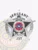 Cedar Creek police sergeant's custom silver metal badge in a five-point star shape with detailed embossing on the edges; features the text "SERGEANT" prominently at the top, a banner saying "CEDAR CREEK," a circular state seal of Texas in red, blue, and rainbow colors at the center with "POLICE DEPARTMENT" around it, "JUNCTION" below, and badge number "137"; attached by a safety pin.